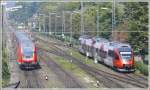 Doppeleinfahrt eines 4024er aus Bregenz und einer Regionalbahn mit Doppelstockwagen aus Friedrichshafen.