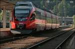 4024 138 verlsst als RB 5126, von Telfs-Pfaffenhofen nach Rosenheim, den Bahnhof Kufstein.