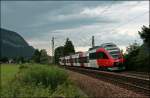 4024 066 flchtet sich als RB 5118 vor dem Regen und ist auf dem Weg nach Rosenheim.