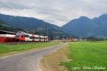 4024 017-8 passiert als R 3597 Schwarzach-St.Veit - Radstadt den Bahnbergang,unweit des Bahnhofs St.Johann im Pongau (sterreichurlaub 13.08.09)