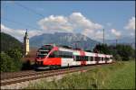 4024 075 ist als RB 5122, Telfs-Pfaffenhofen – Rosenheim, beim Kloster Raisach unterwegs.