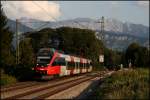 425 071 ist als RB 5126, nach Rosenheim unterwegs. (Kloster Raisach am Abend des 07.08.2009)