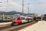 4024 091 verlsst am 24.04.2011 als S1 nach Telfs-Pfaffenhofen den Bahnhof Kufstein.