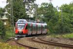 R 5573 Lindau-Feldkirch wird am 12.08.2011 mit 4024 028-5 der BB kurz vor Lindau-Reutin fotografiert (12.07.2011/Lindau-Reutin)