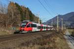 4024 069 als REX 5220 am 19.11.2011 bei Terfens im Inntal.