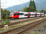 4024 001-2 der S-Bahn Vorarlberg hat Einfahrt in den Bahnhof Bludenz und begibt sich dann auf den Weg nach Schrunz gesehen am 27.09.2009