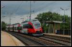 4024 061 am 4.6.2006 bei einer Leerfahrt Richtung Wien Sd-Ostseite bei der Durchfahrt der Haltestelle Lobau.