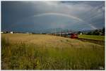 Auf Regen da folgt Sonnenschein - Und der Fotograf freut sich über den wunderbaren Regenbogen, unter welchem 4024 039 als Regional Express in Richtung  Friesach braust.
Zeltweg 23_6_2014