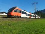 4024 104-4 als R 4612 (Villach Hbf - San Candido/Innichen) am 31.10.2015 beim Halt in Berg im Drautal.