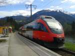 4024 104-4 als R 4865 (Lienz - Spittal-Millstättersee) beim Halt in Berg im Drautal. (14.4.2015)