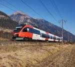 4024 113-5 als S1 4221 (Friesach - Lienz) am 31.12.2015 zwischen den Bahnhöfen Greifenbug-Weißensee und Steinfeld im Drautal.