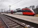 4024 097-0 als S1 4228 (Lienz - Friesach) am 8.2.2015 beim Halt in Greifenburg-Weißensee.