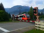 Nachschuss von 4024 120-0 und 4024 097-0 als REX 1738 (Lienz - St. Veit a. d. Glan) bei Berg im Drautal. (18.6.2015)