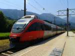 4024 124-2 als R 4861 (Lienz - Spittal-Millstättersee) am 7.7.2015 beim Halt in Greifenburg-Weißensee.