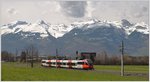 R5715 mit dem 4024 023-6 im Fürstentum Lichtenstein zwischen Nendeln und Schaanwald. Im Hintergrund die Berge des St.Galler Rheintals. (29.03.2016)