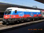 Die russische EM-Lok 1116 084-3 am 30.3.2008 auf dem Wiener Westbahnhof vor dem OIC 646 'Alpendorf Bergbahnen' nach Salzburg.