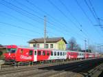 8073 024-6 als Steuerwagen von REX1788 bei der Ausfahrt Bhf.