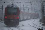 Nachschuss auf eine Railjetgarnitur kurz nach der Durchfahrt in Wien Htteldorf Richtung Westen (8.1.2010)