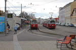 Wien Wiener Linien SL 31 (E2 4064 (SGP 1986)) / SL 30 (E1 4844 (SGP 1975) + c4 1312 (Bombardier-Rotax, vorm. Lohnerwerke, 1974)) XXI, Floridsdorf, Stammersdorf, Bahnhofplatz am 29. November 2019. 