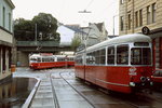 An einem verregneten Junitag 1987 treffen sich der E 4606 als Linie 9 und der E1 4476 als Linie 41 in Gersthof