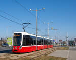 Wien     Wiener Linien Flexity Wien (Typ D) 317 als Linie 18, Heinrich Drimmel-Platz, 02.03.2022.