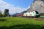 1116 231 mit dem wegen Hochwasserschäden nur bis Salzburg Hbf geführten RJX 869 aus Bregenz bei Kematen in Tirol. (21.09.2024)