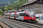 Einfahrt am Mittag des 03.07.2018 von ÖBB 4024 091-3 als REX (Brenner/Brennero - Kufstein) an den Bahnsteig von Matrei am Brenner.