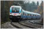 Im strmendem Regen, fhrt 1116 251  SKI AUSTRIA  als railjet 534 von Villach nach Wien Meidling.