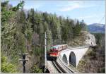 2095 009 mit REX 6810(Mariazell-St. Plten Hbf) bei der berquerung des berhmten Saugrabenviadukts. 23.04.11