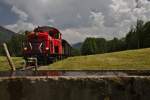 Ein mit der 2091.08 bespannter Dieselzug ist gerade von Bezau nach Schwarzenberg unterwegs.