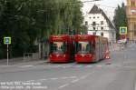 NN303 und 352 kreuzen in der Pastorstrae vor der Remise. 303 ist auf der Linie 1 unterwegs auf dem ewigen Weg zur Kettenbrcke, 352 hingegen ins Stubai. Mitte Juli 2009 kHds