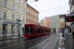 Ab dem Betriebshof der IVB fhrt die Stubaitalbahn auf den Gleisen der Straenbahn zum/vom Hauptbahnhof, hier IVB 326 an der Hst. Museumsstrae am 02.01.2011.