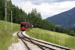 Triebwagen 353 der Stubaitalbahn fhrt am 22.Mai 2011 aus Innsbruck kommend in die Hst.