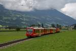 Ein Zug der Zillertalbahn am 10.09.2010 bei Strass, hinten schieb die Lok D 16.