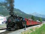 Vormittags-Dampfzug  Abschmierpause  whrend Kreuzungsaufenthalt am Bhf. Fgen/Hart 2006-07-19