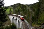 Vom Portal des Ameiskogeltunnels konnte die als 1099.14 beschriftete E14 der NÖVOG mit ihrem Sonderzug auf dem Gösinggrabenviadukt fotografiert werden.