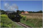 Dampflok 699 101 Dh2t Franco-Belge Bj 1944 fhrt auf der Gurkthalbahn von Pckstein Zwischenwssern nach Treibach Althofen, hier bei der Ausfahrt in Pckstein-Zwischenwssern mit dem Schlo Pckstein