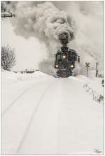 STLB U11 dampft mit einem Sonderzug für die   Railway Touring Company  von Murau nach Tamsweg. 
Ramingstein 7.2.2012