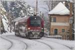 1116 238 schiebt railjet 653 (Wien Meidling - Graz) ber den winterlichen Semmering. 
Breitenstein 19.1.2013