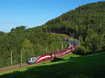 1116.249 und der Ski-WM railjet rollen am 07.09.2013 als rj 658 bei Eichberg talwärts.