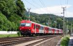8073 028 fhrt am 13.07.2010 mit R4249 von Klagenfurt nach Villach, kurz vor dem nchsten Halt in Krumpendorf am Wrthersee.