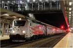 380.011 mit dem EC 173 am 11.12.14 beim Halt in Wr.Neustadt Hbf.