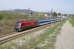 1216.229 fährt mit RJ-71 durch die Hst.Kottingbrunn.