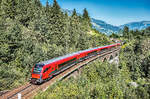 1116 152-0 schiebt den railjet 111 (München Hbf - Klagenfurt Hbf) über das Hundsdorfer-Viadukt bei Bad Hofgastein.
Aufgenommen am 30.8.2017.