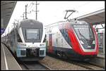 Westbahn 4010.108 und SBB-Twindexx 502.203 nebeneinander im Bahnhof Amstetten am 22.11.2018.