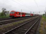 80 73 057-5 zieht, geschoben von 1142 669-9, den REX1662 in den Bahnhof Redl-Zipf; 140428