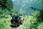 Achenseebahn__Lok 1 mit zwei Vorstellwagen auf Bergfahrt.__08-1973