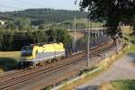 1216.932 mit leeren Holzwagen in Haiding am 26.7.2013 bei einer Abendstimmung