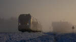 TÜRL NR:21 
Die Nacht von 13. ten auf 14.ten Dezember brachte Neuschnee in die Südweststeiermark . 
Im Morgen Nebel verlässt dieser GTW2/8 den Bahnhof St. Martin im Sulmtal Bergla 
