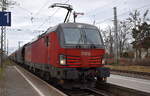 ÖBB-Produktion GmbH, Wien [A] mit ihrer  1293 184  [NVR-Nummer: 91 81 1293 184-8 A-ÖBB] und einem Getreidezug am 31.01.24 Durchfahrt Bahnhof Königsborn.